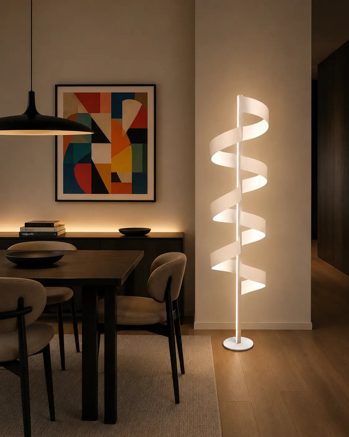 Handmade sculptural floor lamp creating warm indirect light in a modern dining room.