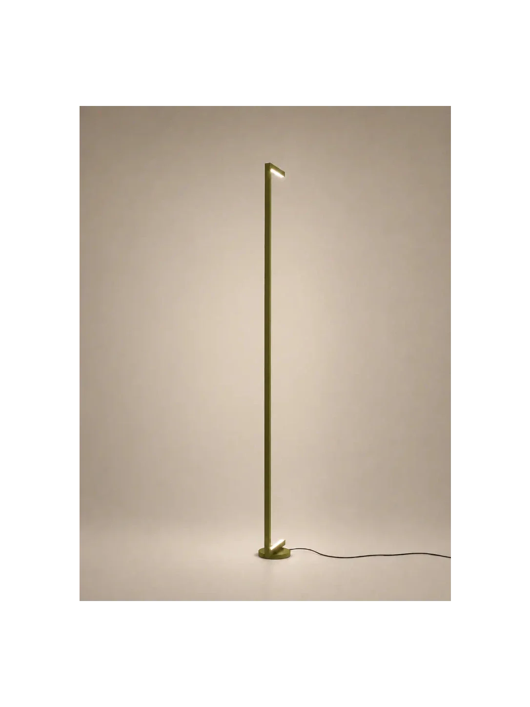 Tratto Floor Lamp with warm indirect light reflected on the wall, handcrafted minimalist sculptural lighting by Tommaso Cristofaro