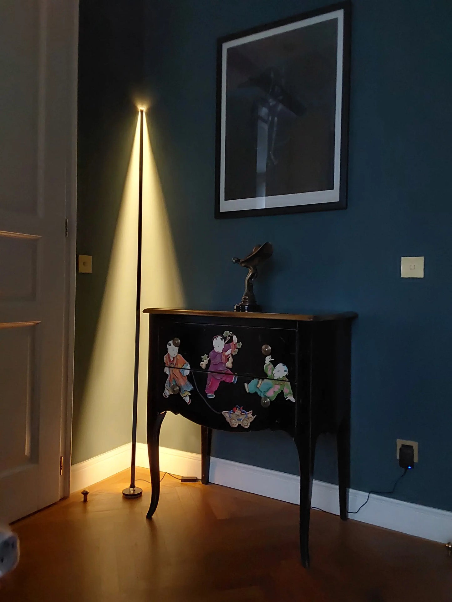 Handmade Gica floor lamp by CristofaroLuce creating indirect light and shadows in a redesigned Vienna interior.