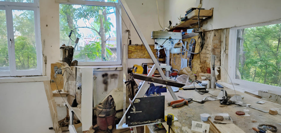 Tommaso Cristofaro working in the CristofaroLuce atelier, where handmade sculptural lamps are designed and crafted in Bucharest.