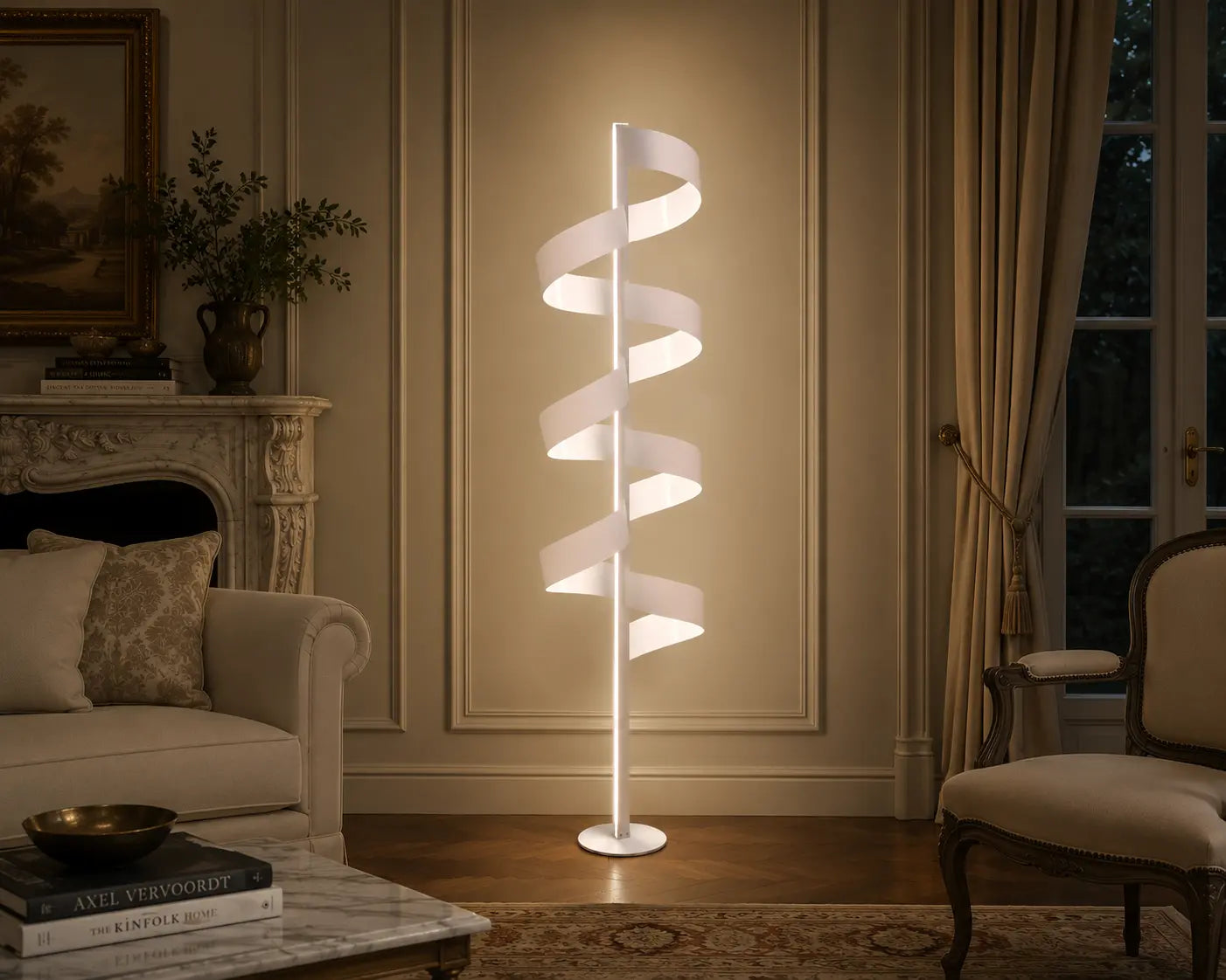 Aura Floor Lamp by Tommaso Cristofaro, handmade white sculptural floor lamp with spiral form and warm indirect light, photographed in a refined contemporary interior.