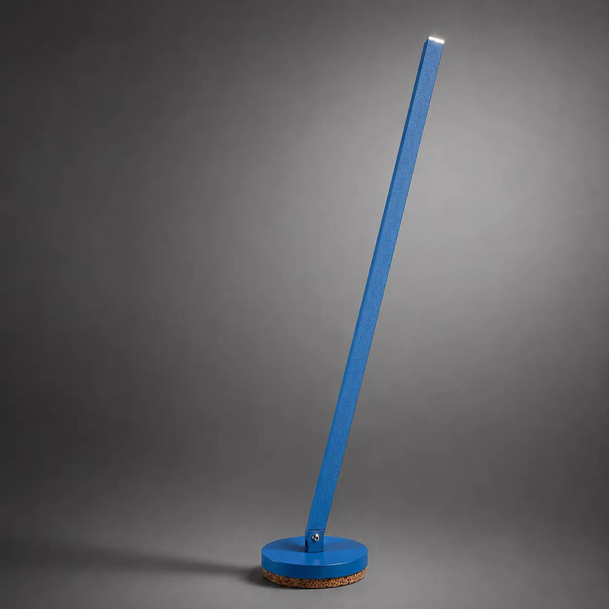 Gica table lamp by Tommaso Cristofaro, sculptural handmade lamp in green olive matte sandblasted finish on a neutral gray studio background