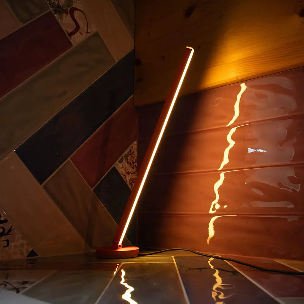 Gica Contra Table Lamp in Red – Minimalist handmade desk light with indirect wall glow designed by Tommaso Cristofaro
